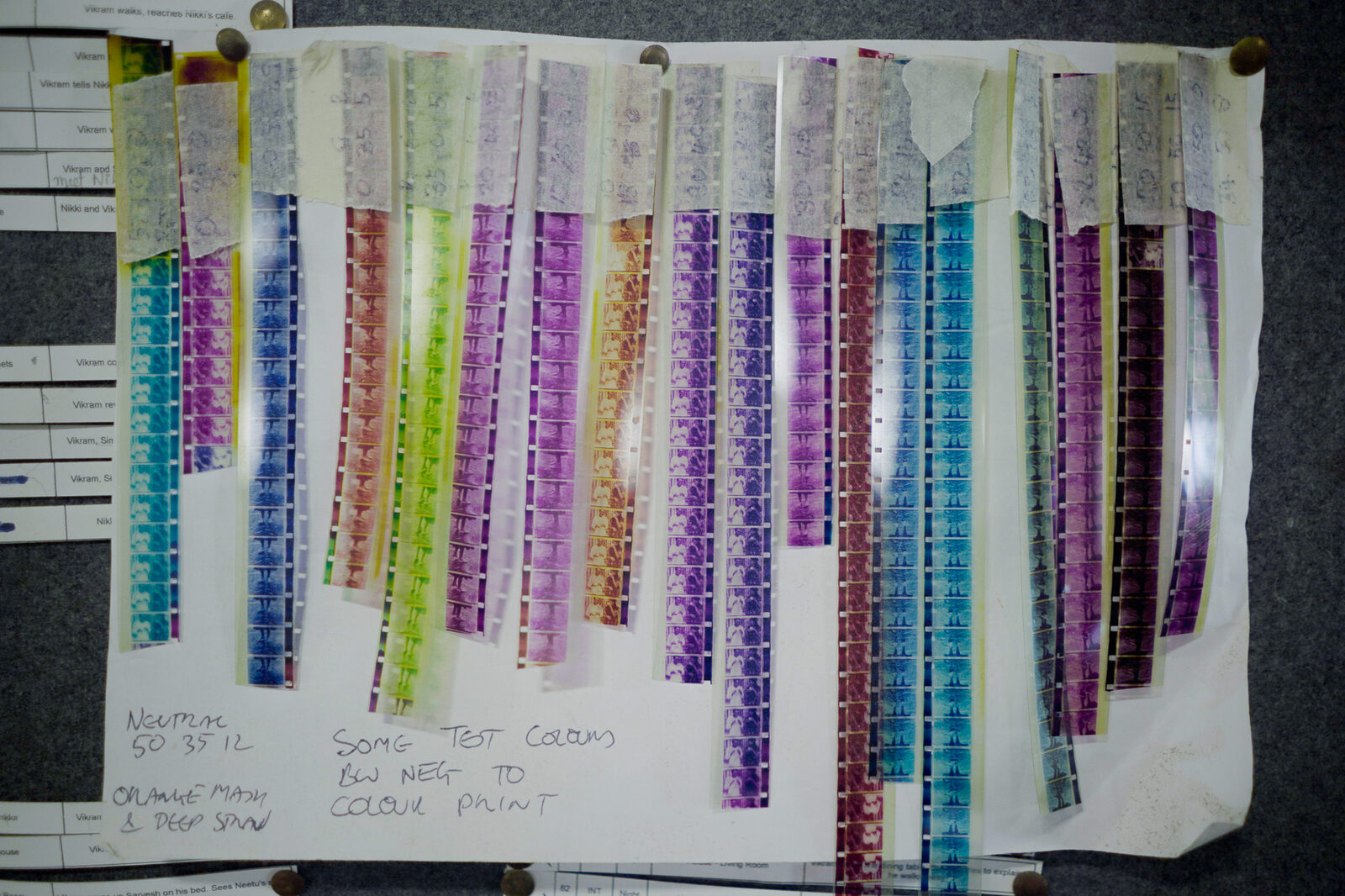 Rows of hand-processed colour film strips